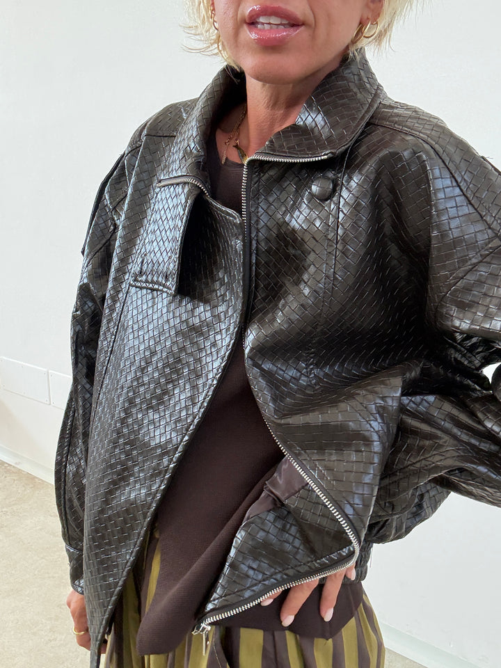 BOMBER INTRECCIATO BOTTONE MORO