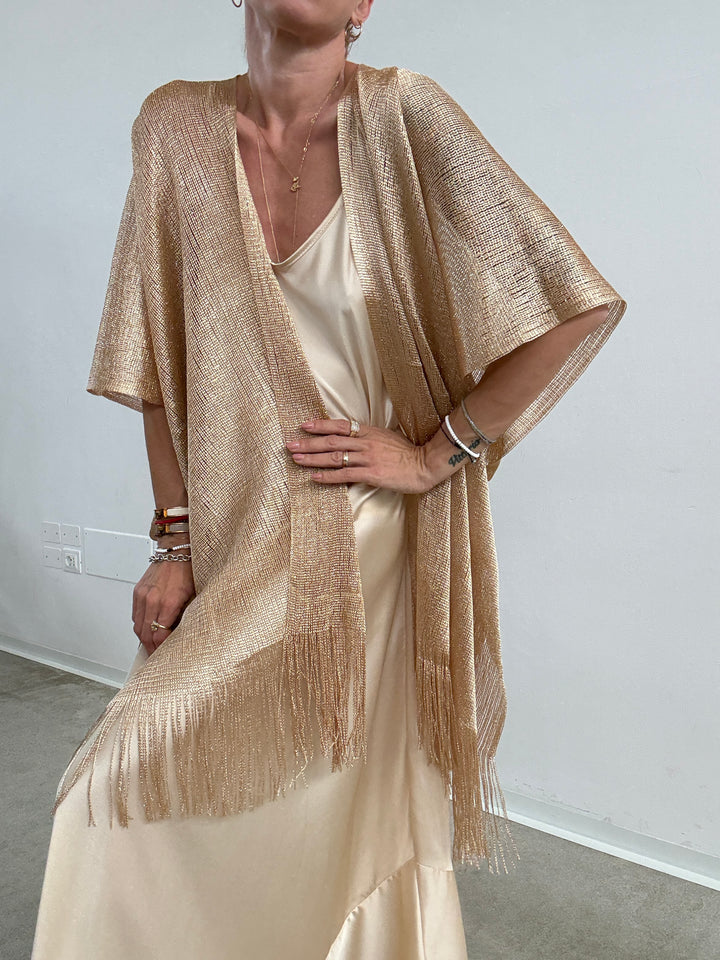 PONCHO LUREX ORO