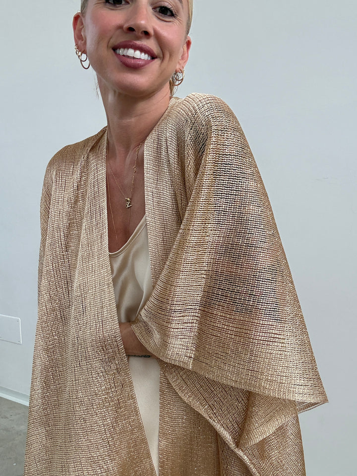 PONCHO LUREX ORO