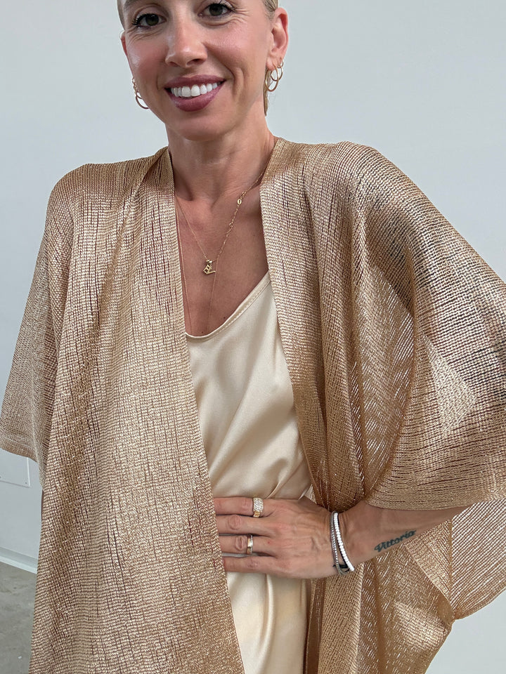 PONCHO LUREX ORO